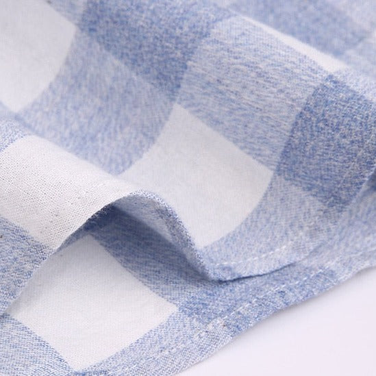 Maurice Plaid Shirt fabric detail showcasing blue and white check pattern.