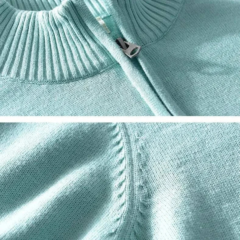 Autumn half zipper cotton sweater in soft teal, showcasing ribbed collar and zipper detail.