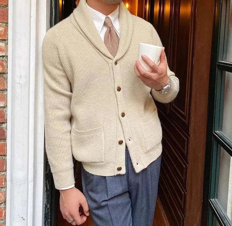 Oxford premium cardigan in apricot, casual elegant style, worn by a man holding a cup.