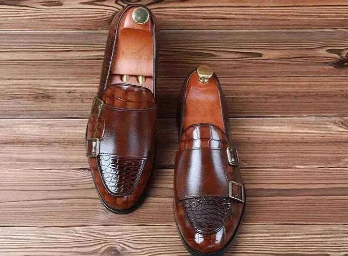 Crocodile pattern microfiber shoes with intricate perforations and leather insole.