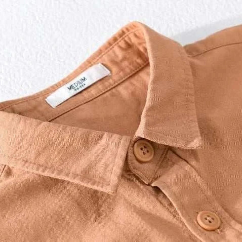 Premium short sleeve summer shirt in solid color cotton fabric.