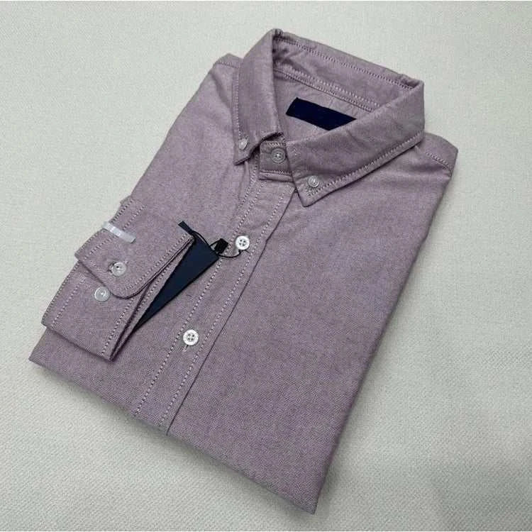 Oxford business casual long sleeve cotton shirt folded, made of high-quality cotton.