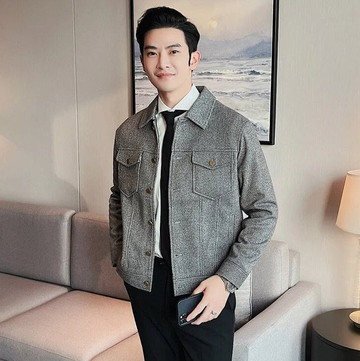 Man wearing WINT casual jacket in elegant setting.