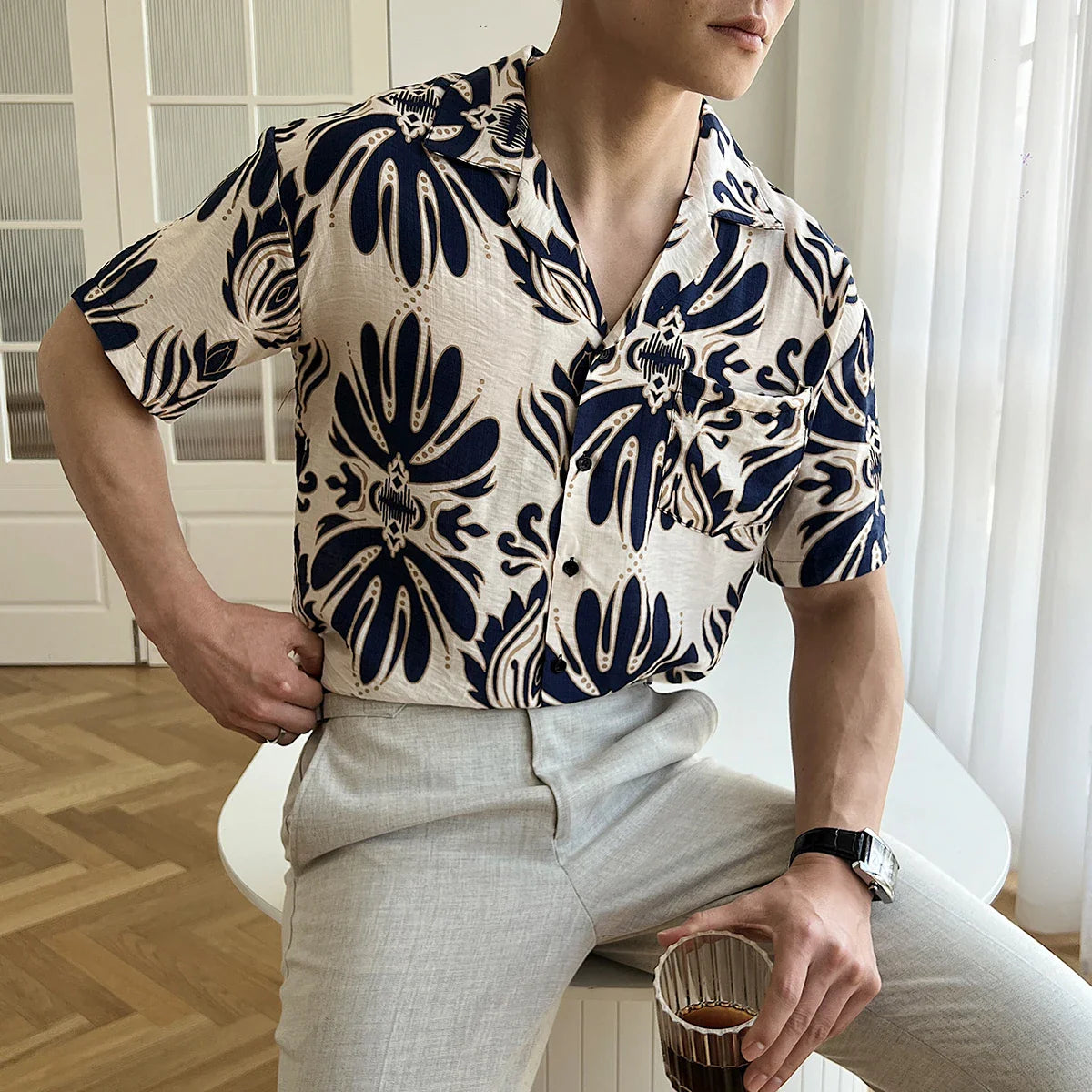 Wrinkle-Free loose short sleeve Cuban shirt in blue and beige pattern worn by a man.