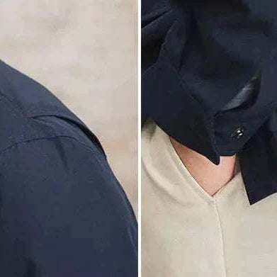 Close-up of a British Old Money Jacket in navy, featuring high-quality cotton material with button details, showcasing elegant and sophisticated design.