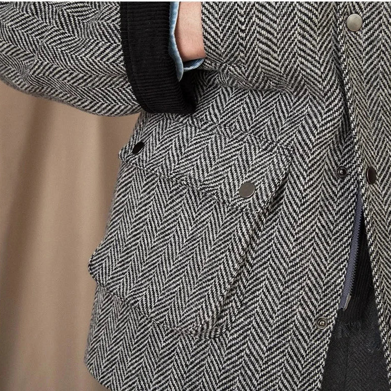 Wool heavy vintage coat for men in herringbone pattern with buttoned pockets.