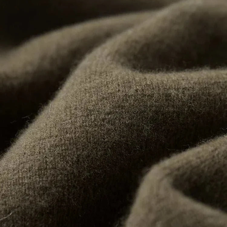 Close-up of soft fabric texture from Antonios wool polo collar cardigan.