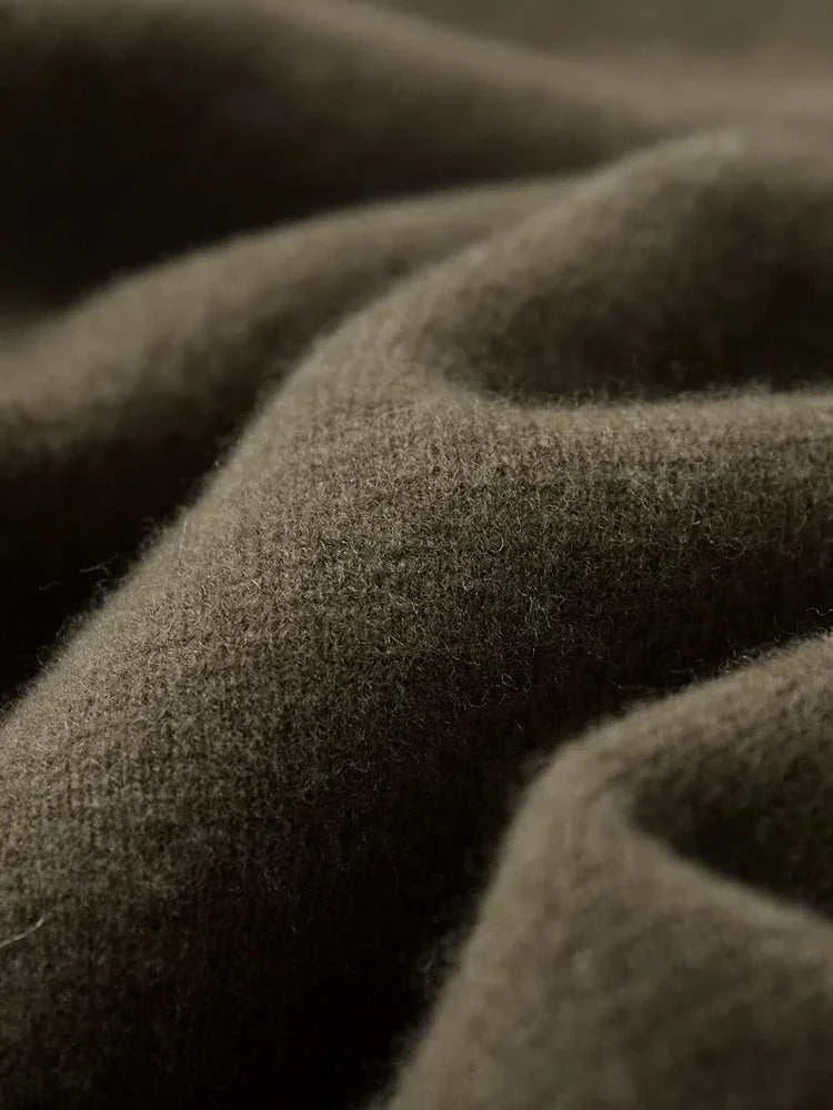Close-up of soft fabric texture from Antonios wool polo collar cardigan.