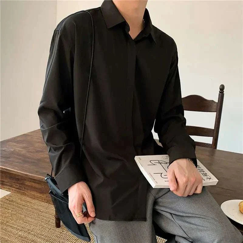 Business loose long-sleeve shirt for men in solid black viscose fiber, perfect for spring/summer office or casual wear.
