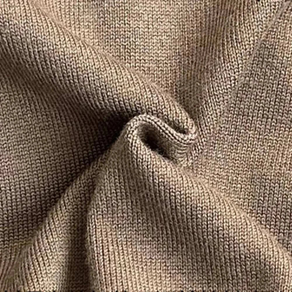 Close-up texture of Fall season retro jacket fabric blend of wool and polyester.