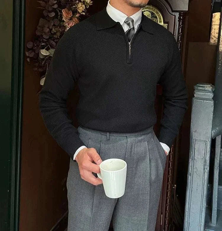 Oxford zipper sweater in black, solid pattern, worn by a man holding a mug.