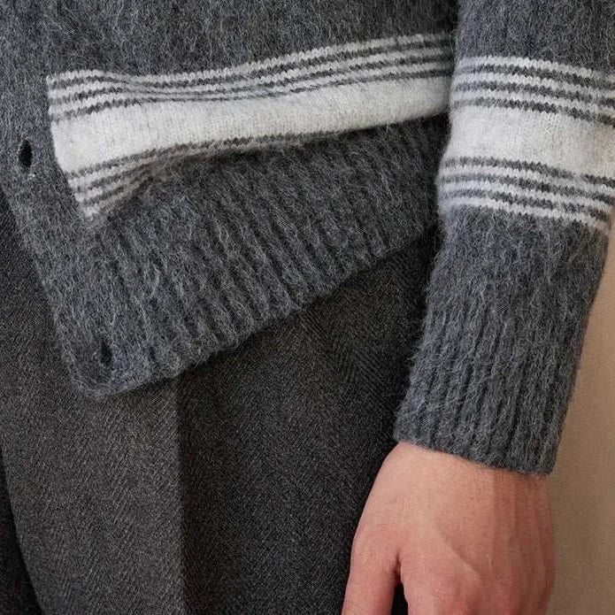 Antonios striped wool v-neck cardigan close-up showing texture and design.