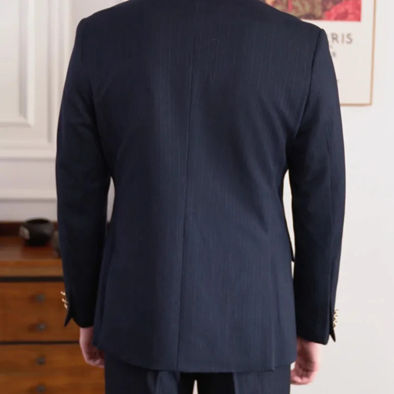 Rear view of a person wearing a Business office Italian suit in dark color, showcasing its classy and stylish design.