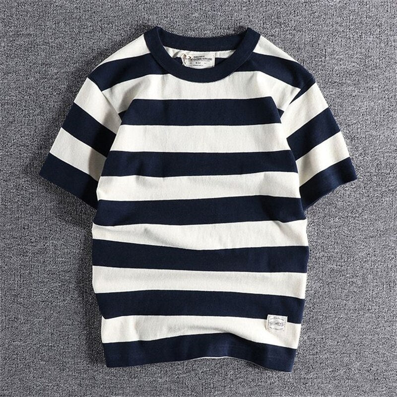Summer Striped T-Shirt in navy and white bold stripes on gray background.