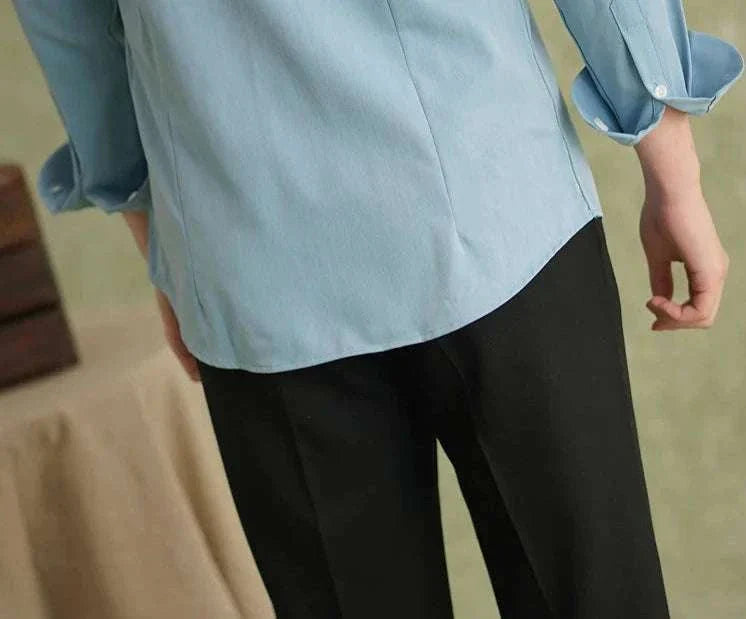 Spring pointer collar long sleeve shirt in light blue, made from polyester and spandex, showcasing a casual and elegant style.