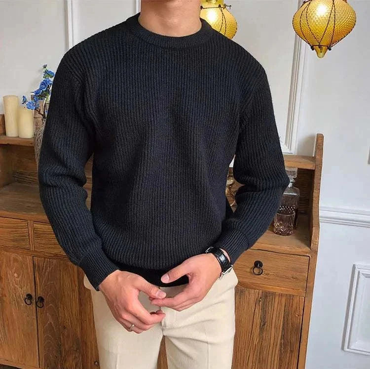 Antonios solid round neck knit sweater in black, made from high-quality wool for men.