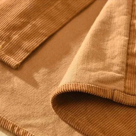 Cotton corduroy fabric details of spring shirt for men, showcasing soft and breathable material for spring/summer.