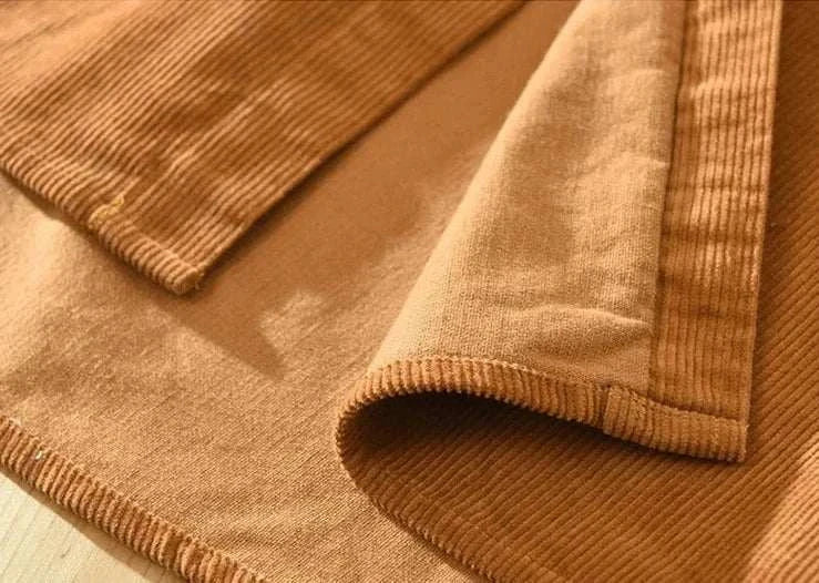 Cotton corduroy fabric details of spring shirt for men, showcasing soft and breathable material for spring/summer.