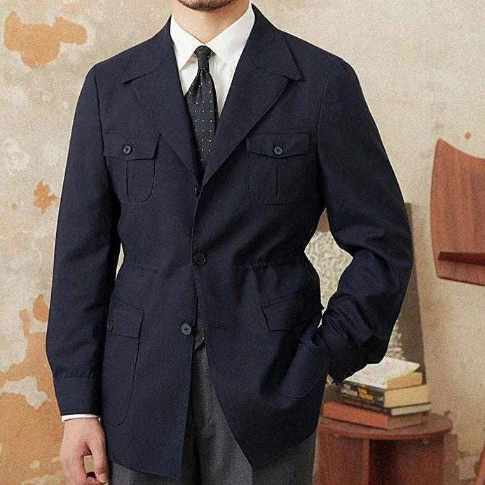 Elegant man wearing the Autumn vintage old money coat in a stylish indoor setting.