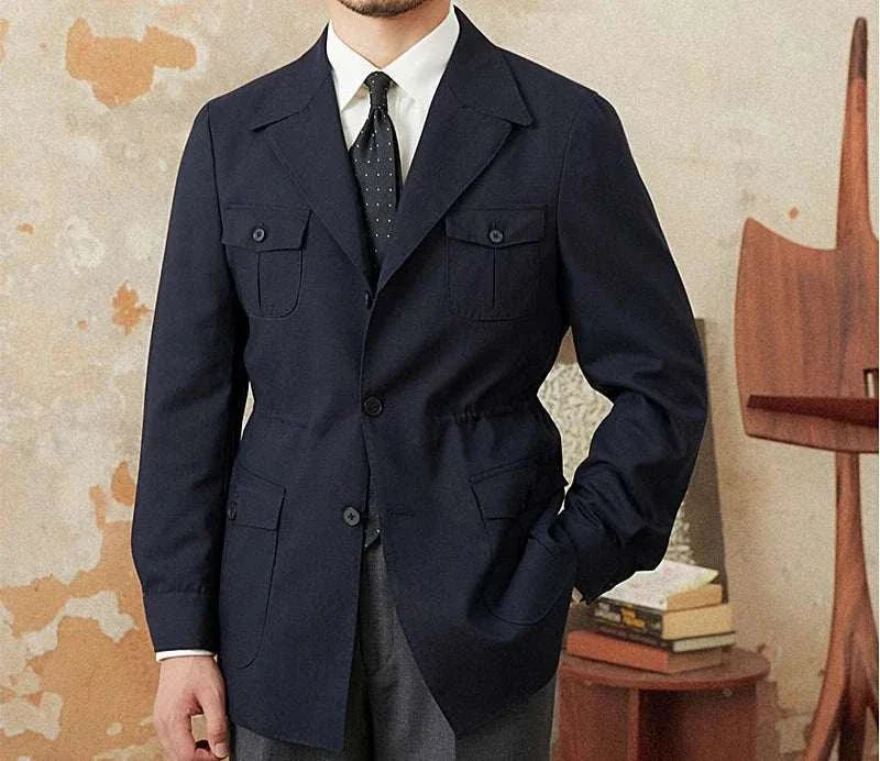 Elegant man wearing the Autumn vintage old money coat in a stylish indoor setting.