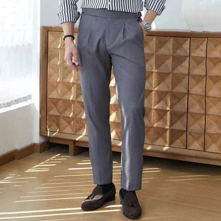 Elegant British suit pants in grey, ideal for formal occasions, showcasing style and comfort with a sophisticated look.