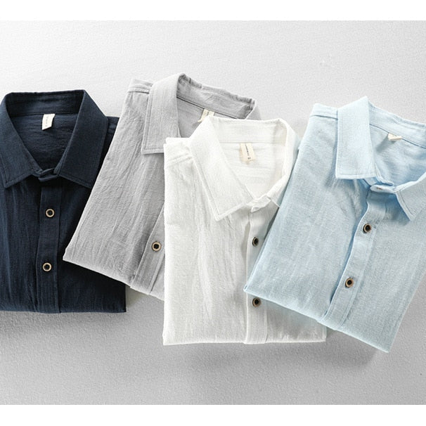 Maurice Solid Shirt in cotton and linen blend in navy, gray, white, and light blue colors.