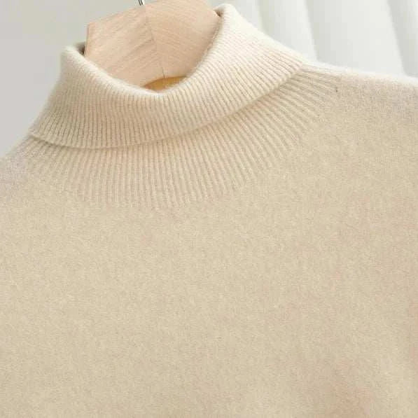 Business wool turtleneck sweater on hanger, high-quality blend.