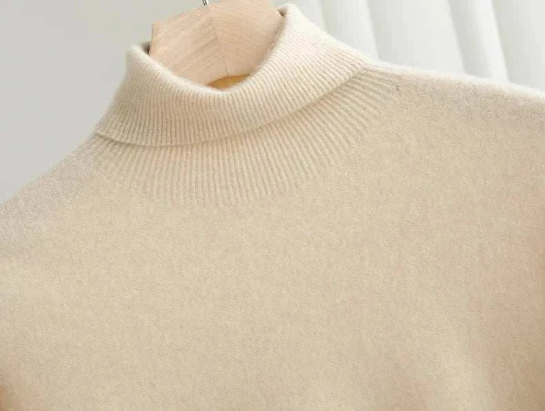 Business wool turtleneck sweater on hanger, high-quality blend.