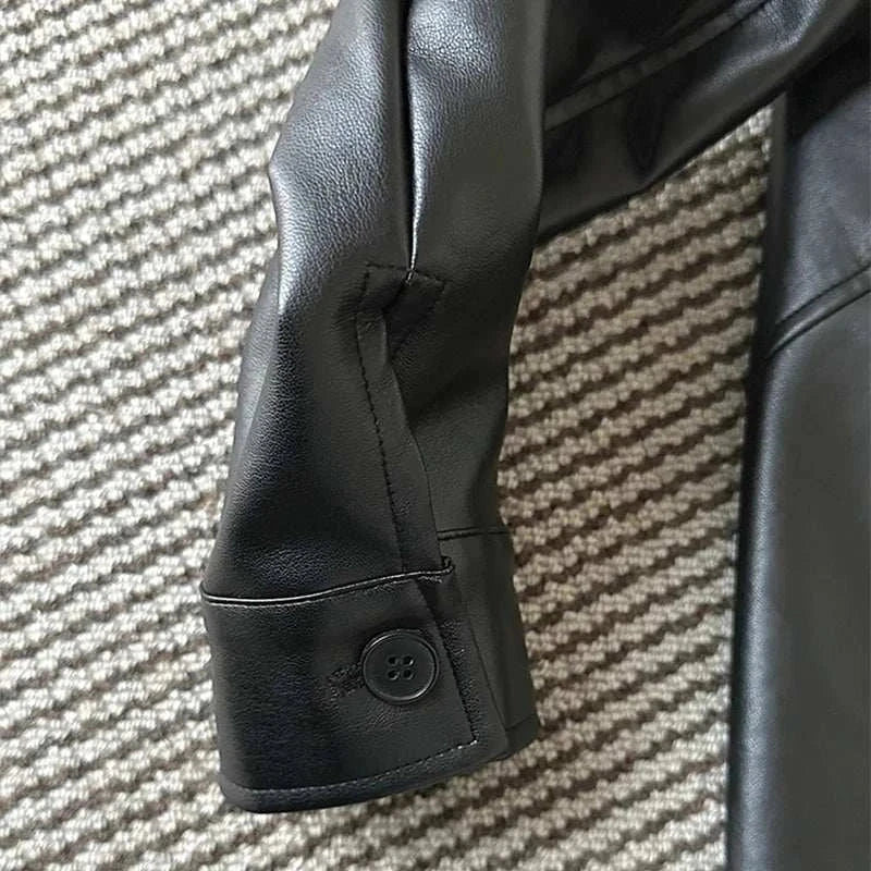 PU leather vintage jacket sleeve detail.