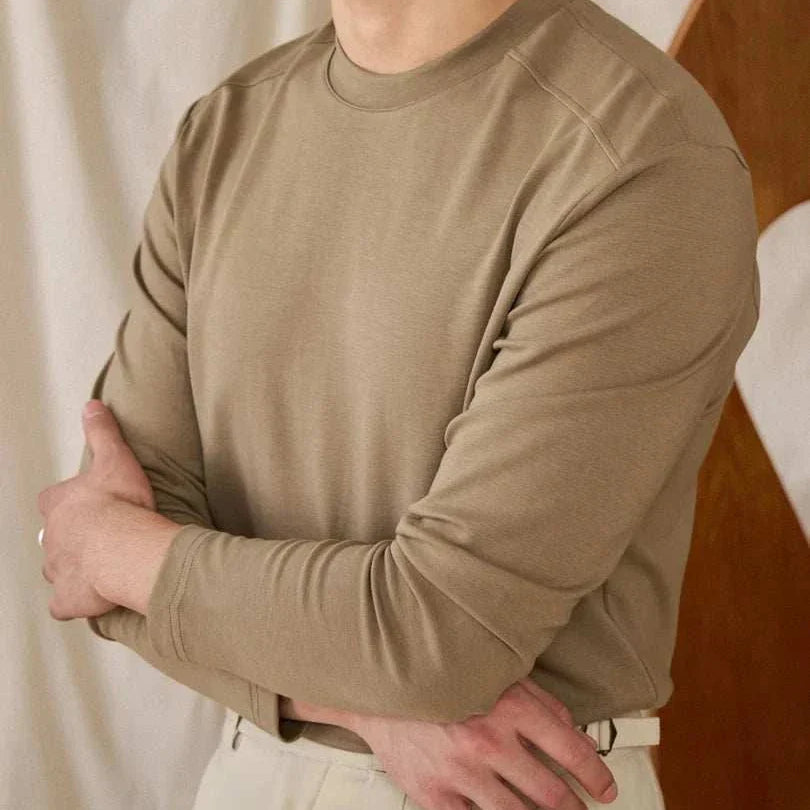 Slim fit smart casual premium men's sweater in beige on model.