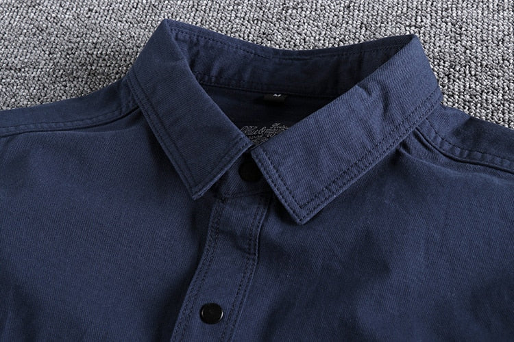 Navy vintage-retro cotton shirt with classic design and button-down collar.