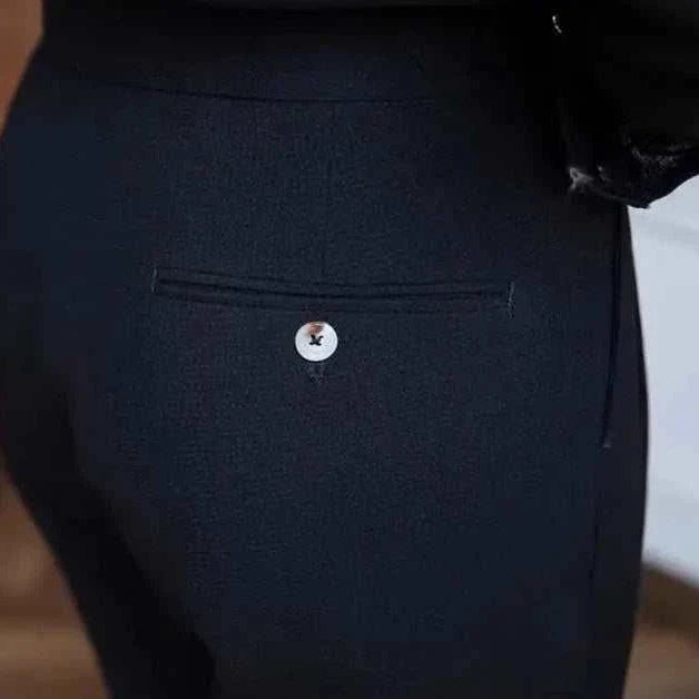 High-waist belt design trousers in luxurious viscose.