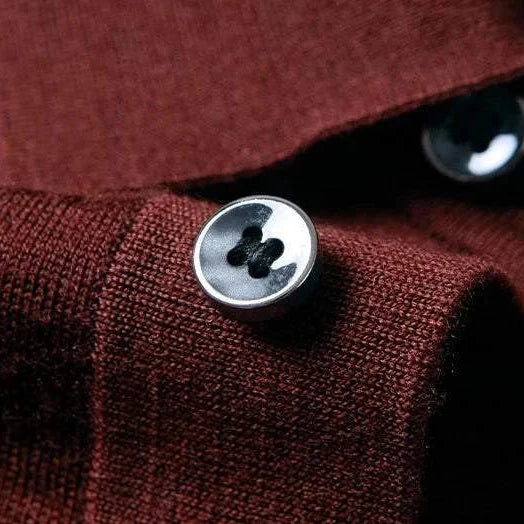 Slim fit wool autumn sweater with button detail.