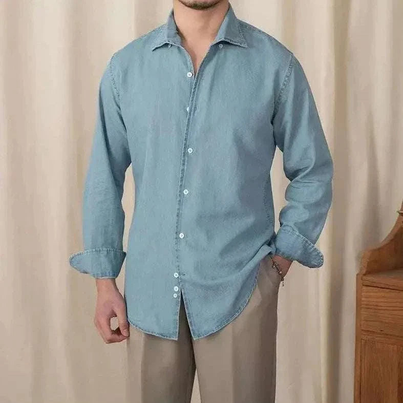 Vintage casual long sleeve shirt for men in solid blue with lightweight fabric.