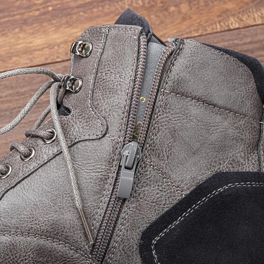 ANT ankle boots with zipper detail, showcasing high-quality craftsmanship and minimalist design.