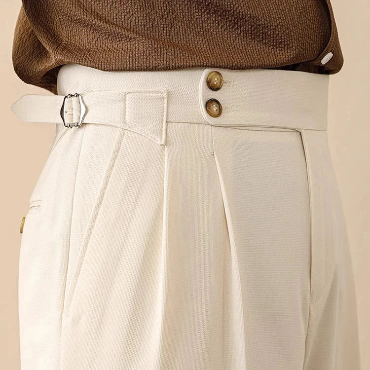 White trousers for business or social occasions, featuring a belt loop and button detail for modern gentlemen.