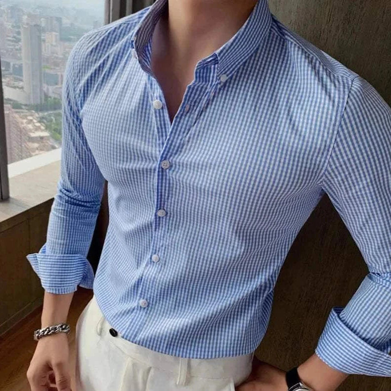 Men's cotton long sleeve plaid shirt for a casual and elegant look.