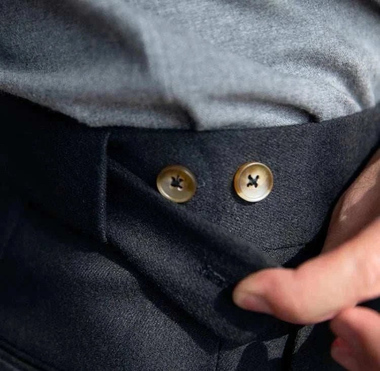 Close-up of button detail on Autumn/Winter retro Italian trousers.