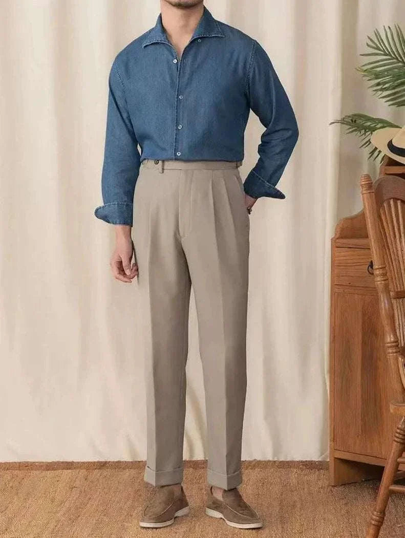 Vintage casual long sleeve shirt for men in solid blue with beige trousers; elegant and breathable cotton blend.