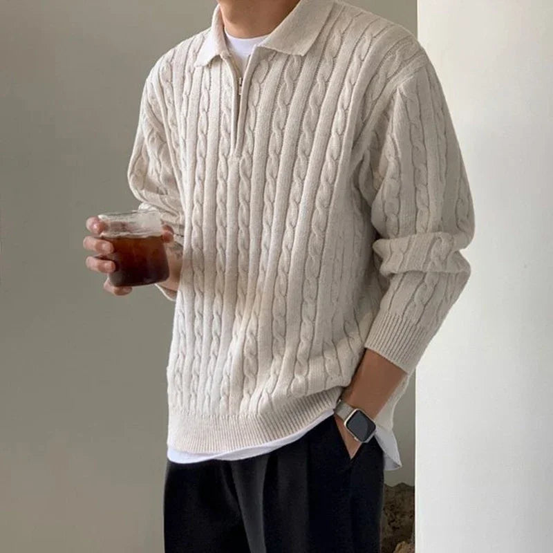 Vintage design sweater with solid pattern, featuring ribbed cuffs and collar.