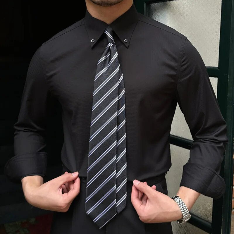 Antonios Oxford Shirt in solid black, smart casual style, worn with a striped tie.