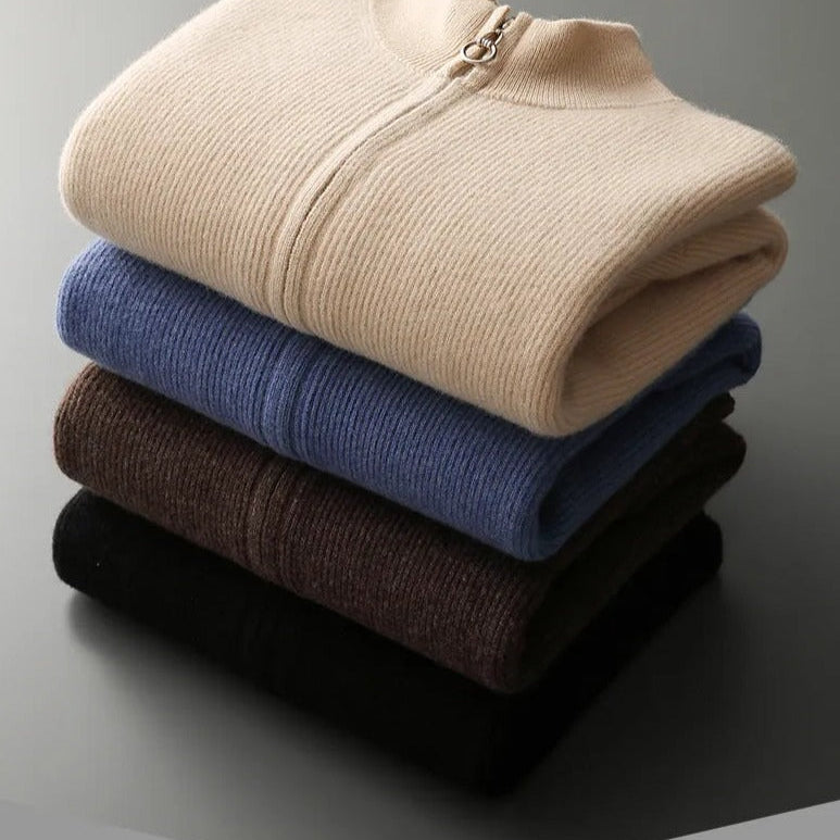Folded pure wool cardigans in beige, blue, brown, and black.