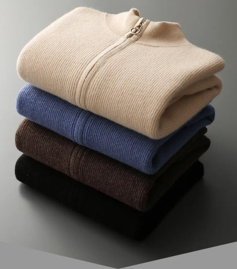 Folded pure wool cardigans in beige, blue, brown, and black.