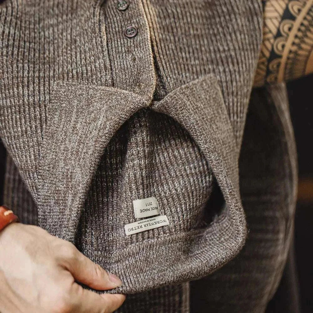 Retro knitted cold season sweater in high-quality viscose, showcasing soft and durable fabric with a solid pattern.