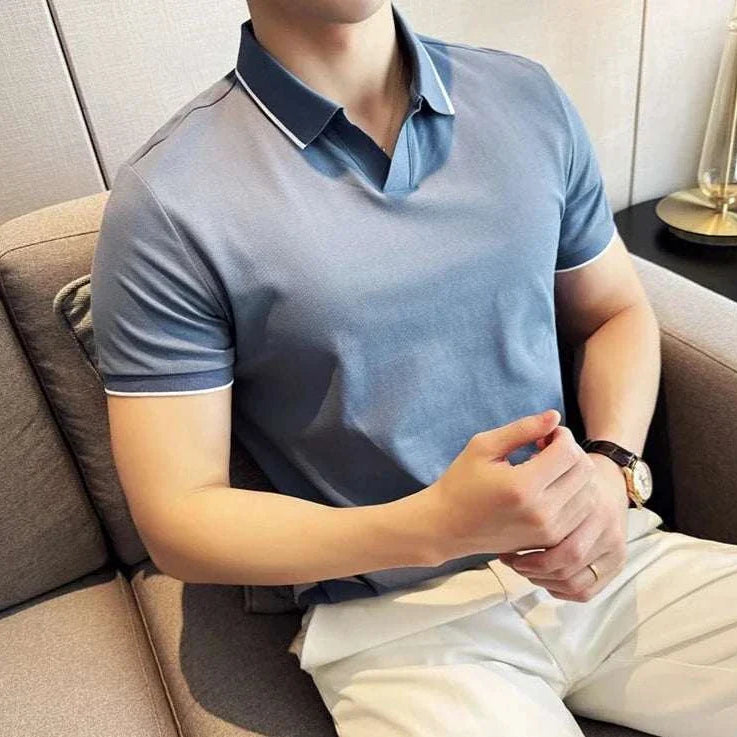 British slim fit summer polo t-shirt in solid blue, ideal for spring/summer comfort and style.