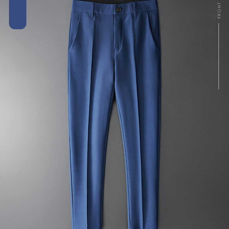Vinny Office Pants in blue, tailored smart casual trousers with front pockets, showcasing classic elegance.