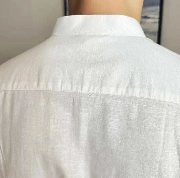 Linen smart casual long-sleeve shirt in solid white fabric.