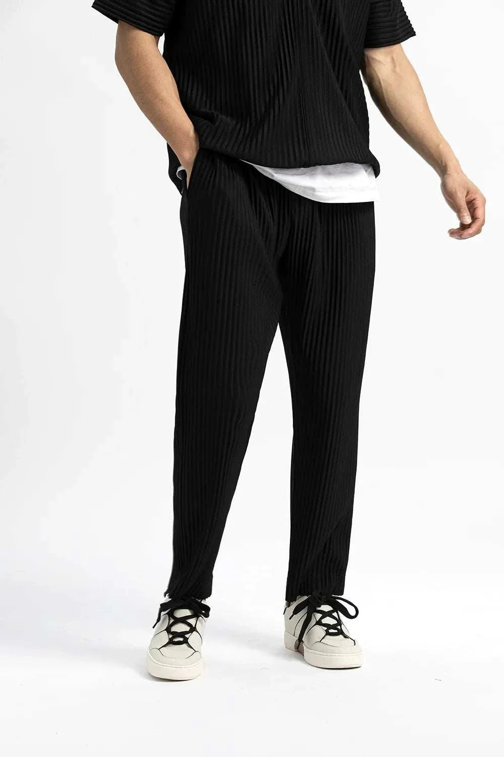 Baggy relaxed fit casual trousers for men in solid black, comfortable and stylish.
