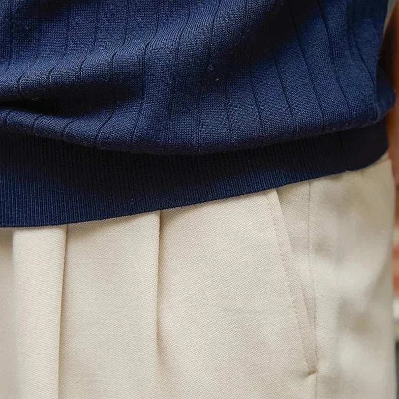 Old money polo English t-shirt close-up, showcasing solid blue Iyocell material.