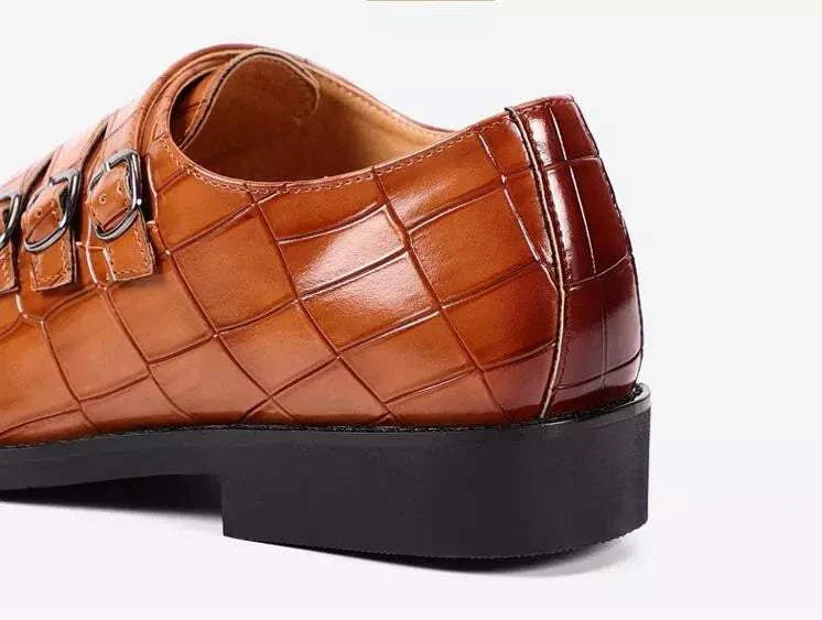 Oxford triple strip-on shoes in light brown leather with buckle details and geometric texture.